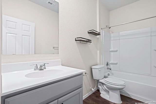 759 Crested Iris, New Braunfels, TX 78130 - bathroom with vanity, wood finished floors, bathtub / shower combination, and a textured wall