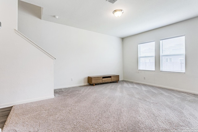 5323 Flying Hooves, San Antonio, TX 78222 - carpeted empty room with baseboards and a smoke detector