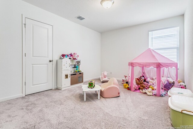 5323 Flying Hooves, San Antonio, TX 78222 - recreation room featuring carpet flooring and baseboards