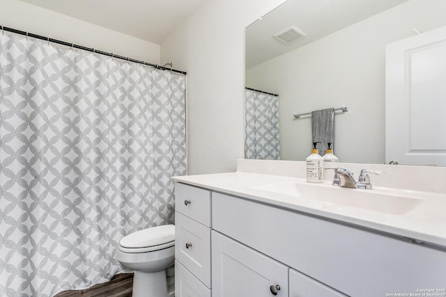 5323 Flying Hooves, San Antonio, TX 78222 - bathroom with toilet and vanity
