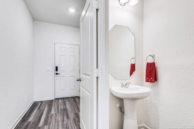 5323 Flying Hooves, San Antonio, TX 78222 - bathroom with wood finished floors and baseboards