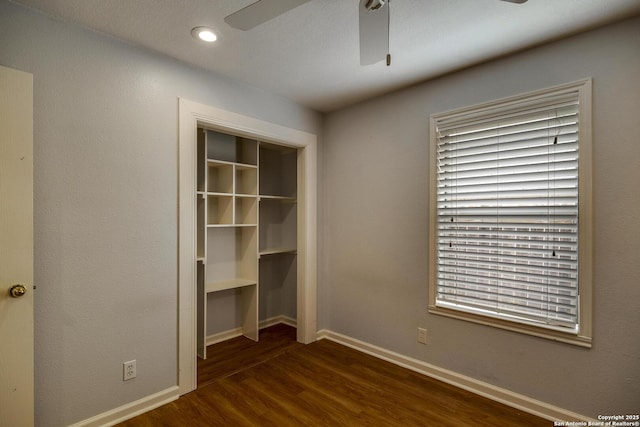 15306 Spring Dew, San Antonio, TX 78247 - unfurnished bedroom with dark wood-style flooring, a closet, and ceiling fan