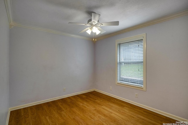 15306 Spring Dew, San Antonio, TX 78247 - unfurnished room with crown molding, wood finished floors, and ceiling fan