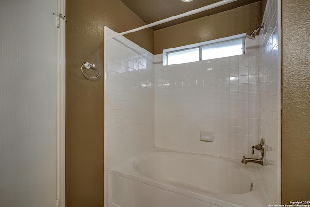 15306 Spring Dew, San Antonio, TX 78247 - bathroom featuring a textured wall and washtub / shower combination