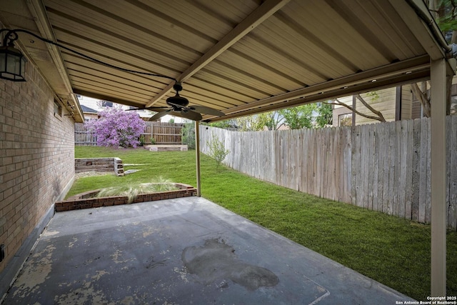 15306 Spring Dew, San Antonio, TX 78247 - fenced backyard featuring a patio and ceiling fan