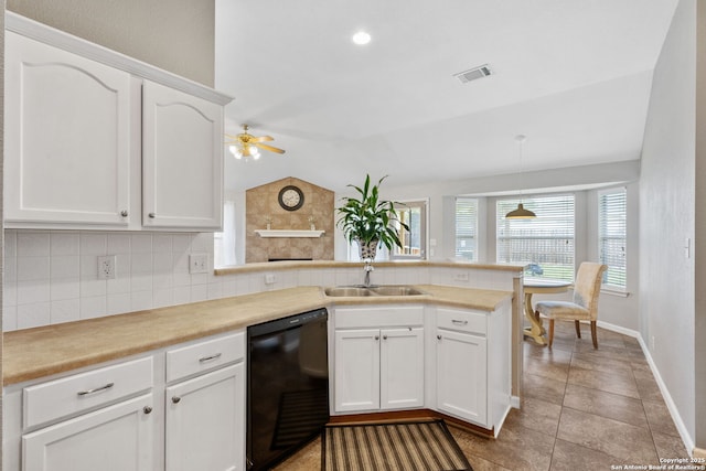 9511 Autumn Run, Converse, TX 78109 - kitchen with dishwasher, a peninsula, decorative backsplash, a ceiling fan, and white cabinetry