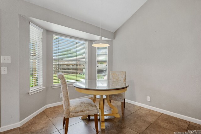 9511 Autumn Run, Converse, TX 78109 - dining room featuring vaulted ceiling and tile patterned floors