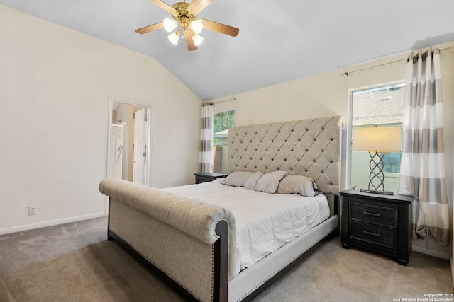 9511 Autumn Run, Converse, TX 78109 - bedroom with light colored carpet, vaulted ceiling, ceiling fan, and ensuite bath