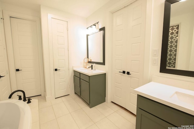 137 Mescalero, Boerne, TX 78006 - bathroom with tile patterned floors, two vanities, and a tub