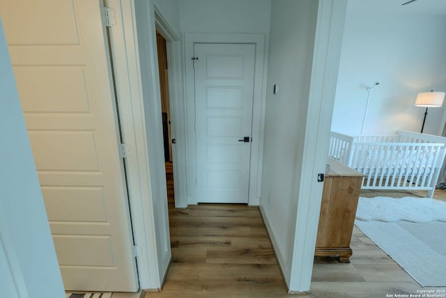 137 Mescalero, Boerne, TX 78006 - corridor with light wood finished floors and baseboards