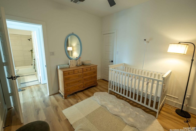 137 Mescalero, Boerne, TX 78006 - bedroom featuring light wood-type flooring and a nursery area