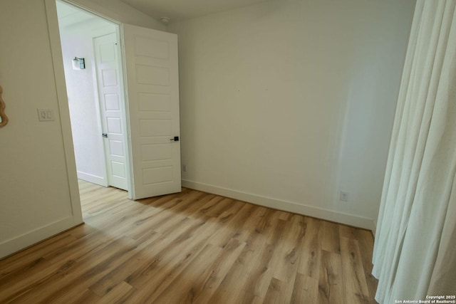 137 Mescalero, Boerne, TX 78006 - spare room featuring baseboards and light wood-style floors