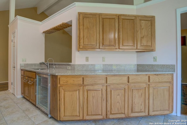 201 Cibolo Xing, Boerne, TX 78006 - kitchen with beverage cooler, light stone countertops, and light tile patterned floors