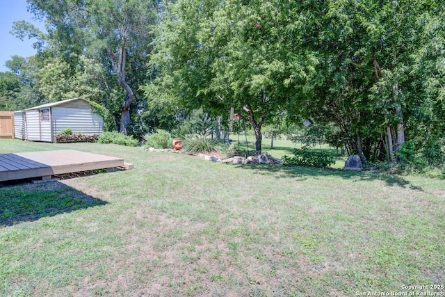 201 Cibolo Xing, Boerne, TX 78006 - view of grassy yard featuring a wooden deck and a shed