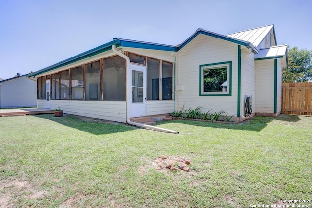 201 Cibolo Xing, Boerne, TX 78006 - view of side of home featuring a sunroom, a standing seam roof, and a metal roof