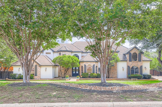 342 Candelaria, Helotes, TX 78023 - view of front of house with stucco siding and a tile roof