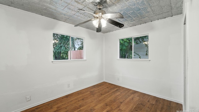 1029 Valley Frg, Schertz, TX 78154 - empty room featuring an ornate ceiling, wood finished floors, and a ceiling fan