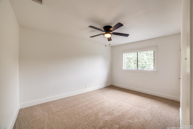 7711 Chatsworth, San Antonio, TX 78250 - unfurnished room featuring light carpet and a ceiling fan