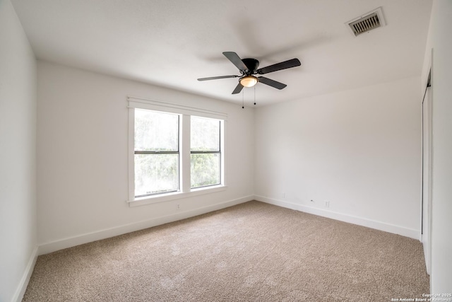 7711 Chatsworth, San Antonio, TX 78250 - spare room with carpet floors and a ceiling fan