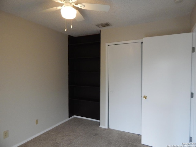 4119 Medical Unit 304F, San Antonio, TX 78229 - unfurnished bedroom featuring carpet, a closet, and ceiling fan