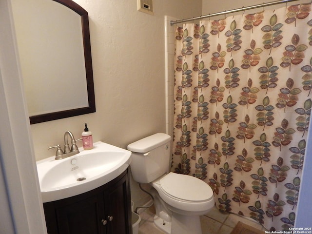 4119 Medical Unit 304F, San Antonio, TX 78229 - bathroom with vanity, a shower with shower curtain, and tile patterned flooring