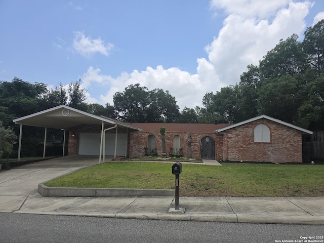 5214 King George, San Antonio, TX 78229 - single story home featuring an attached garage, brick siding, a front yard, and driveway