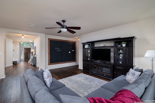 401 Canterbury, Cibolo, TX 78108 - living area with arched walkways, ceiling fan, and wood finished floors