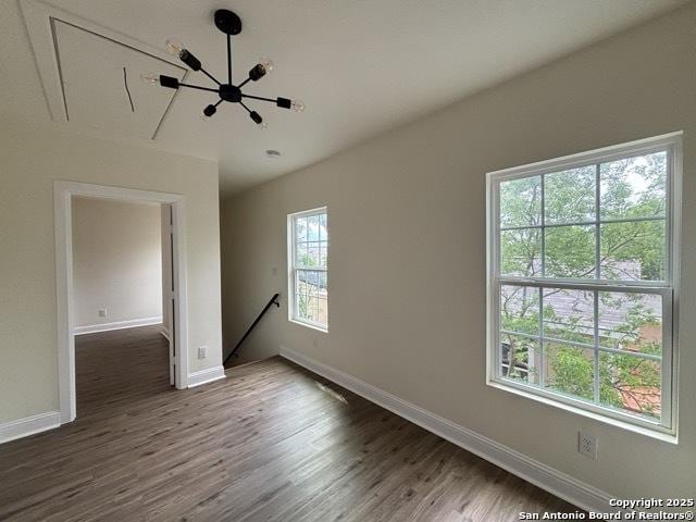 1014 Montana, San Antonio, TX 78203 - spare room featuring dark wood-style flooring