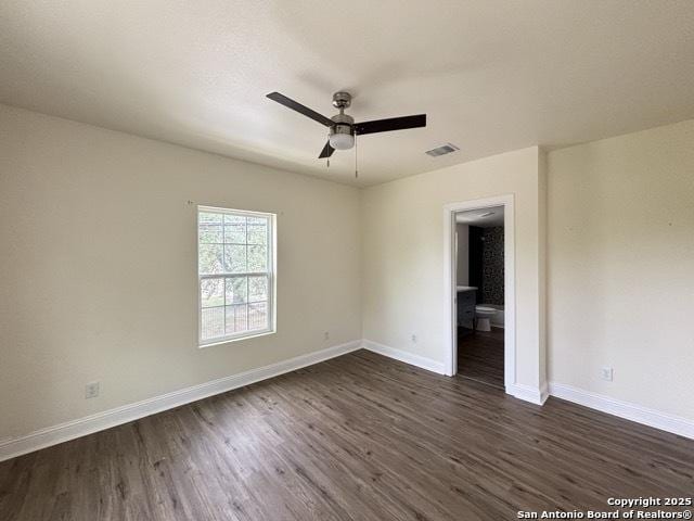 1014 Montana, San Antonio, TX 78203 - empty room with dark wood-style floors and a ceiling fan