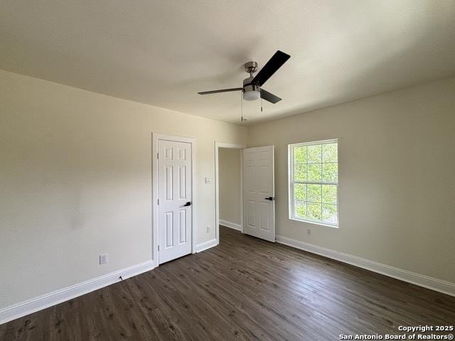 1014 Montana, San Antonio, TX 78203 - unfurnished bedroom featuring dark wood-style flooring and ceiling fan