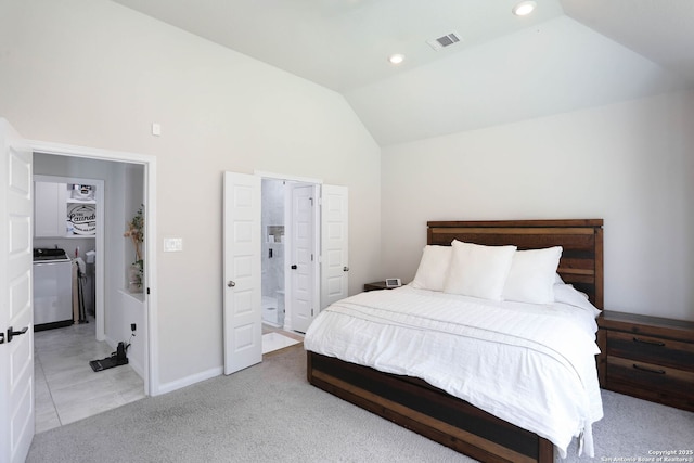2863 Tortuga Verde, San Antonio, TX 78245 - bedroom with vaulted ceiling, washing machine and clothes dryer, and light carpet