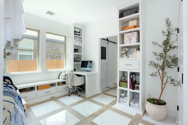 2863 Tortuga Verde, San Antonio, TX 78245 - home office with a barn door and inlaid floor details