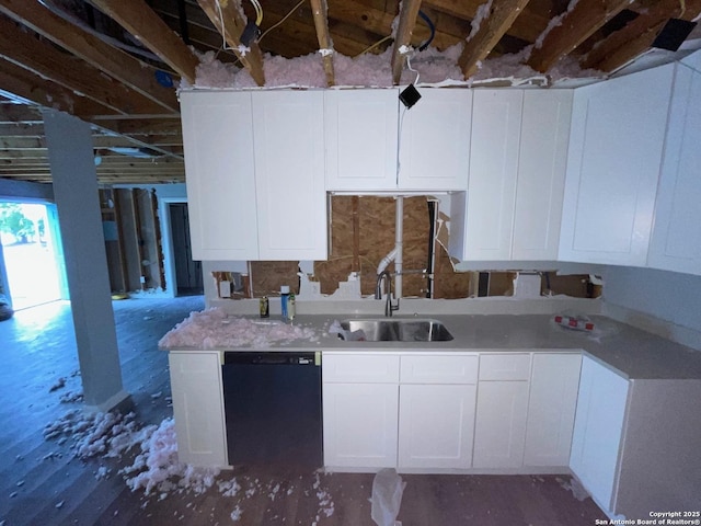 103 Saint Martin, San Antonio, TX 78202 - kitchen with black dishwasher, white cabinetry, and light countertops