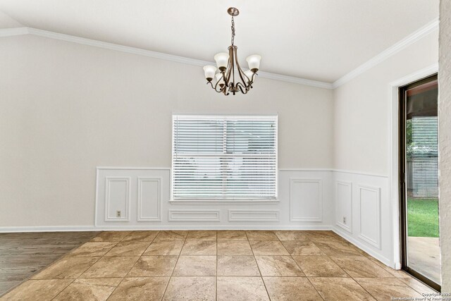 3410 Lone Valley St, San Antonio, TX 78247 - unfurnished dining area with a chandelier, crown molding, vaulted ceiling, and wainscoting
