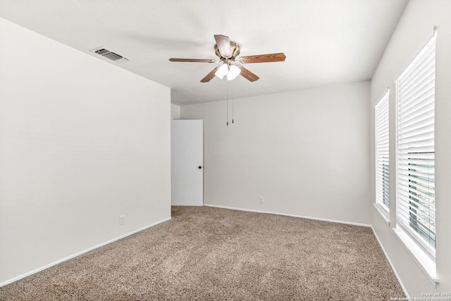 3410 Lone Valley St, San Antonio, TX 78247 - empty room with carpet floors, a ceiling fan, and plenty of natural light