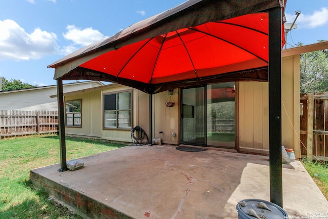3410 Lone Valley St, San Antonio, TX 78247 - rear view of property featuring a gazebo and a patio area