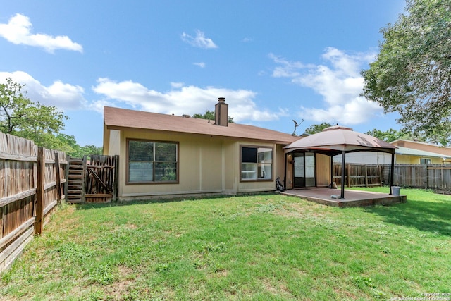 3410 Lone Valley St, San Antonio, TX 78247 - back of house with a gazebo, a patio area, and a fenced backyard