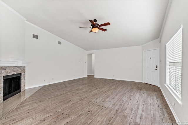3410 Lone Valley St, San Antonio, TX 78247 - unfurnished living room with a ceiling fan, wood finished floors, crown molding, a fireplace, and lofted ceiling