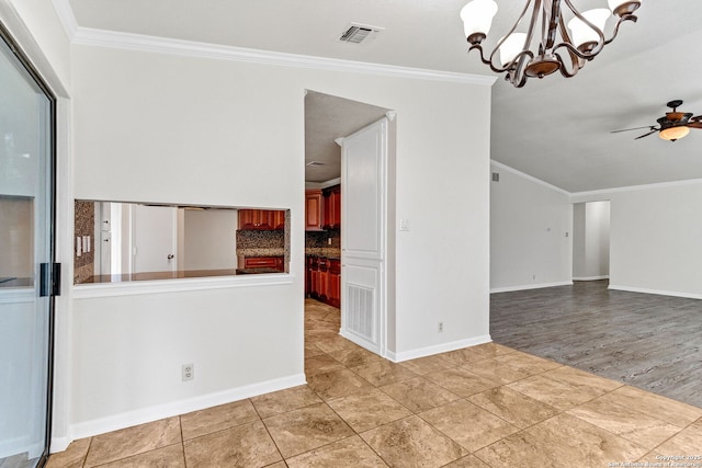3410 Lone Valley St, San Antonio, TX 78247 - empty room featuring crown molding, a ceiling fan, a chandelier, and light tile patterned floors