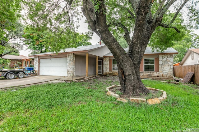 14410 Briarberry, San Antonio, TX 78247 - single story home with stone siding, an attached garage, and concrete driveway