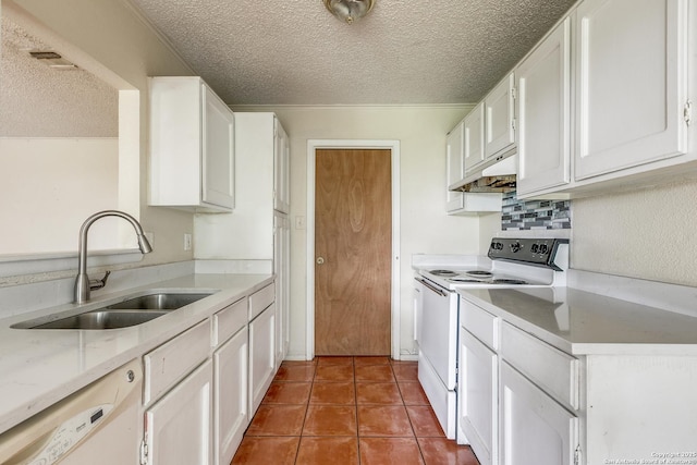 14410 Briarberry, San Antonio, TX 78247 - kitchen with white appliances, under cabinet range hood, a textured ceiling, white cabinets, and dark tile patterned floors