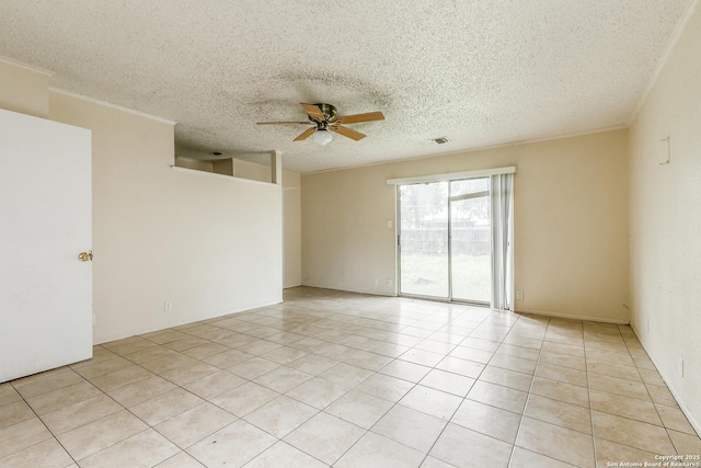 14410 Briarberry, San Antonio, TX 78247 - empty room with a ceiling fan, a textured ceiling, and light tile patterned flooring