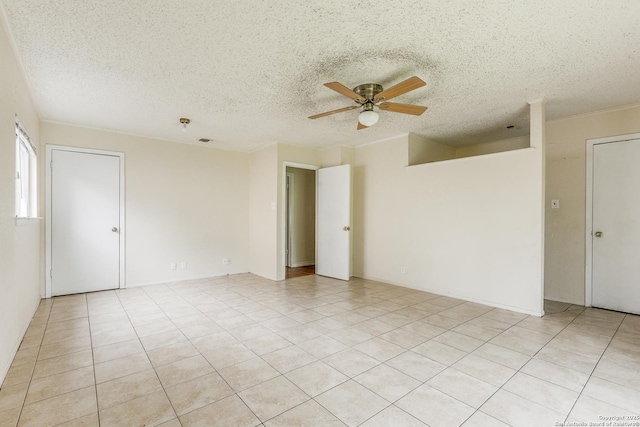 14410 Briarberry, San Antonio, TX 78247 - unfurnished room featuring a ceiling fan, a textured ceiling, and light tile patterned floors