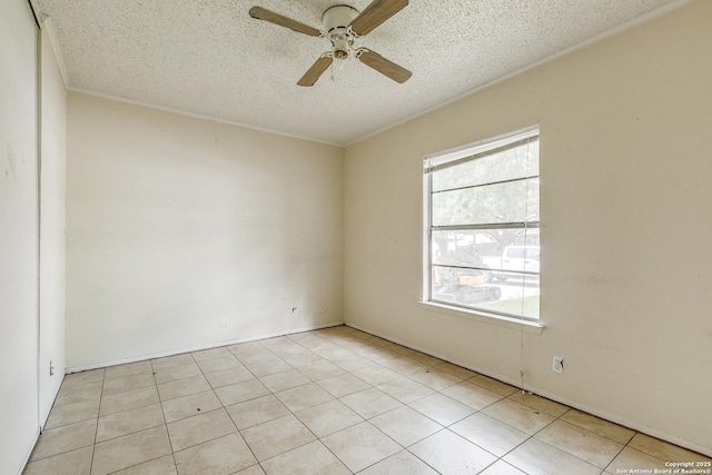 14410 Briarberry, San Antonio, TX 78247 - empty room with ceiling fan, a textured ceiling, and light tile patterned floors