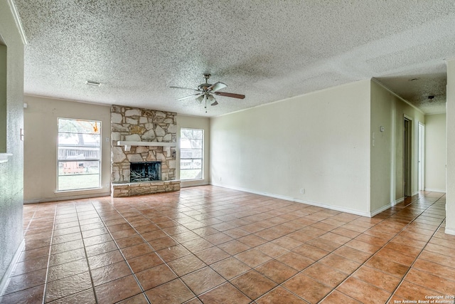 14410 Briarberry, San Antonio, TX 78247 - unfurnished living room featuring healthy amount of natural light, ceiling fan, a textured ceiling, and tile patterned flooring