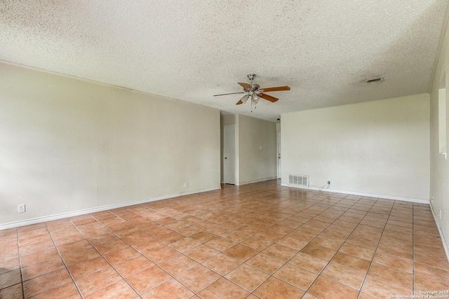 14410 Briarberry, San Antonio, TX 78247 - empty room with a ceiling fan, a textured ceiling, and light tile patterned floors