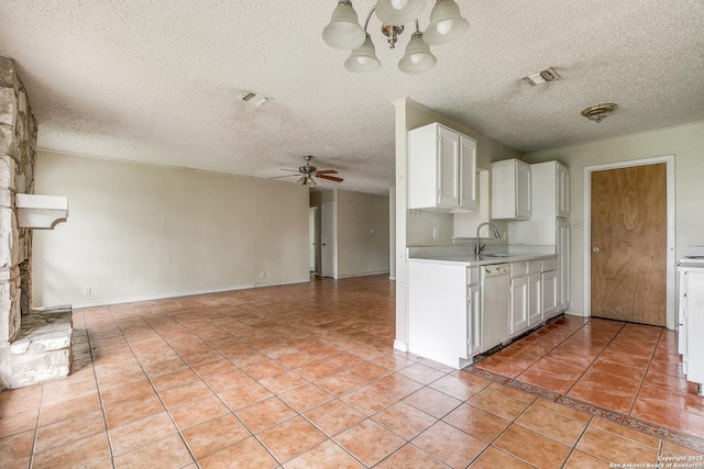 14410 Briarberry, San Antonio, TX 78247 - kitchen featuring dishwasher, light countertops, ceiling fan, light tile patterned floors, and white cabinetry