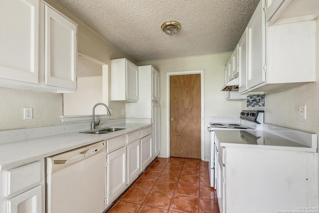 14410 Briarberry, San Antonio, TX 78247 - kitchen with white appliances, white cabinetry, under cabinet range hood, light countertops, and a textured ceiling