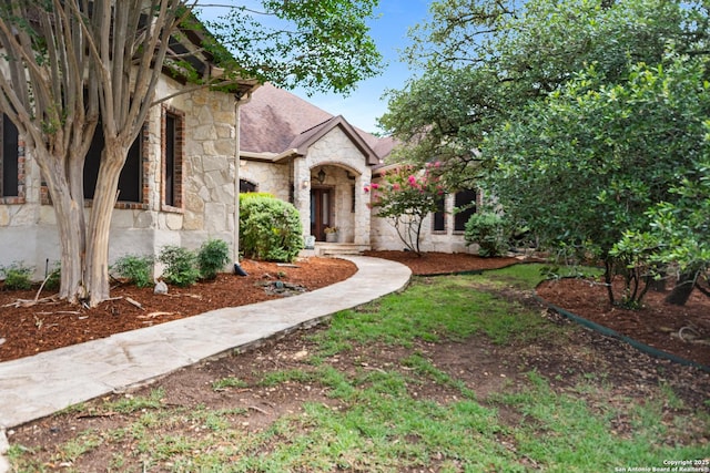 106 Oak Meadow Ln, Boerne, TX 78006 - view of front of home with stone siding and a shingled roof
