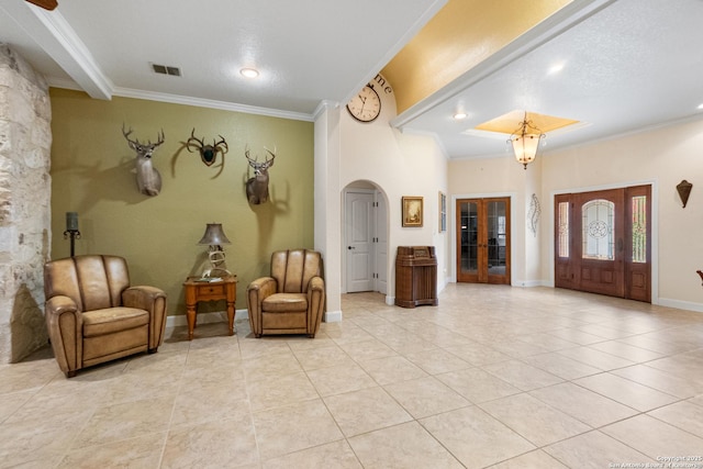 106 Oak Meadow Ln, Boerne, TX 78006 - entryway with arched walkways, ornamental molding, light tile patterned floors, and french doors